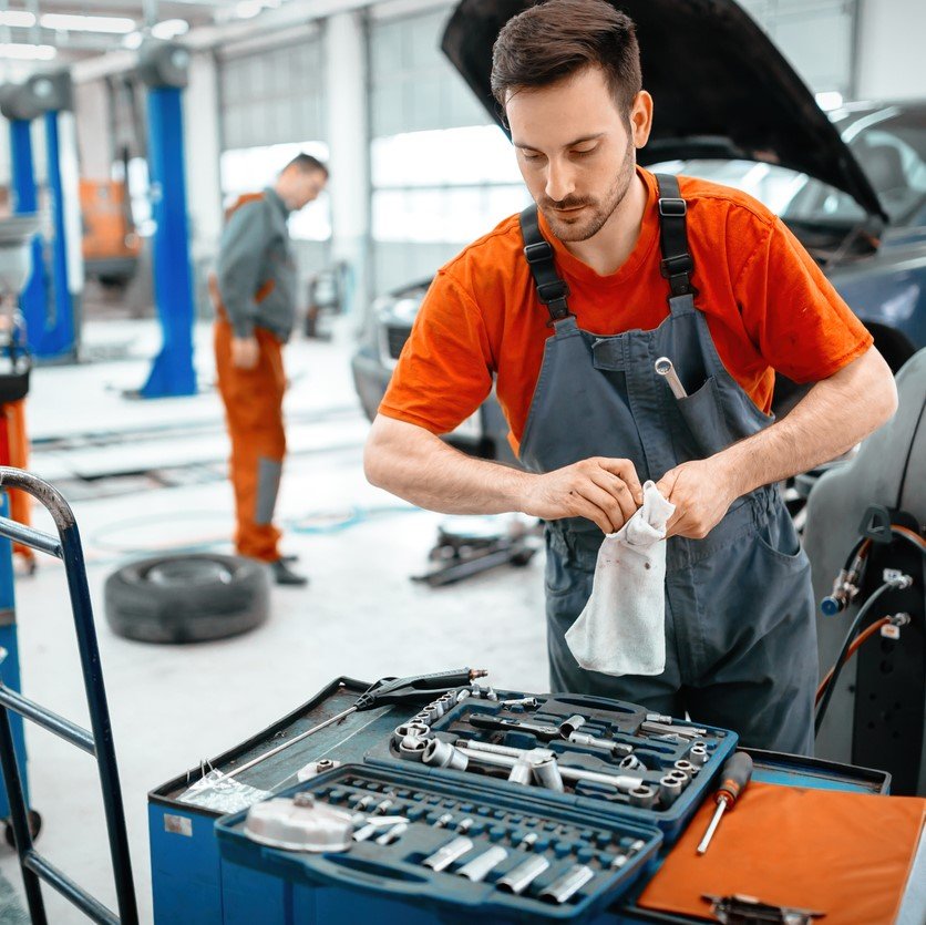 car mechanic keeping tools polished and clean
